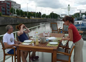 Dining on the Sundeckof the 6 passenger Johanna barge